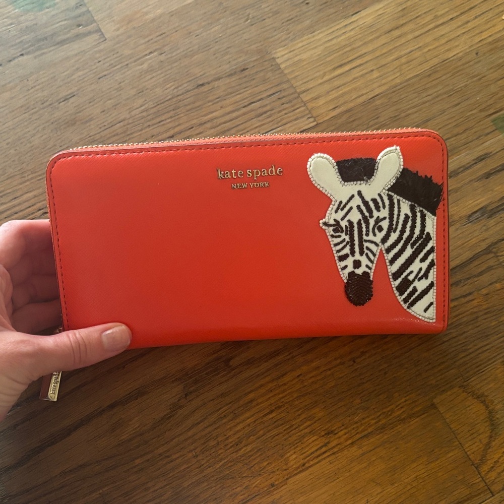 Kate Spade Vibrant Orange Wallet with Zebra Accent